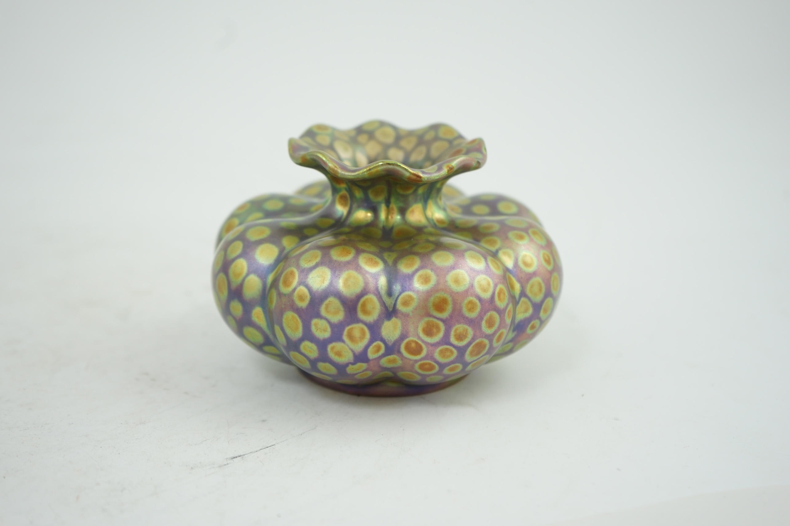 A Zsolnay spotted lustre pumpkin shaped vase, early 20th century